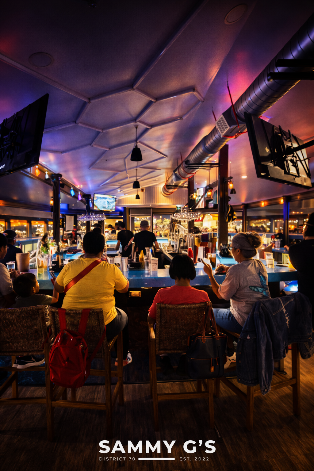 Guests seated at Sammy G's upstairs bar