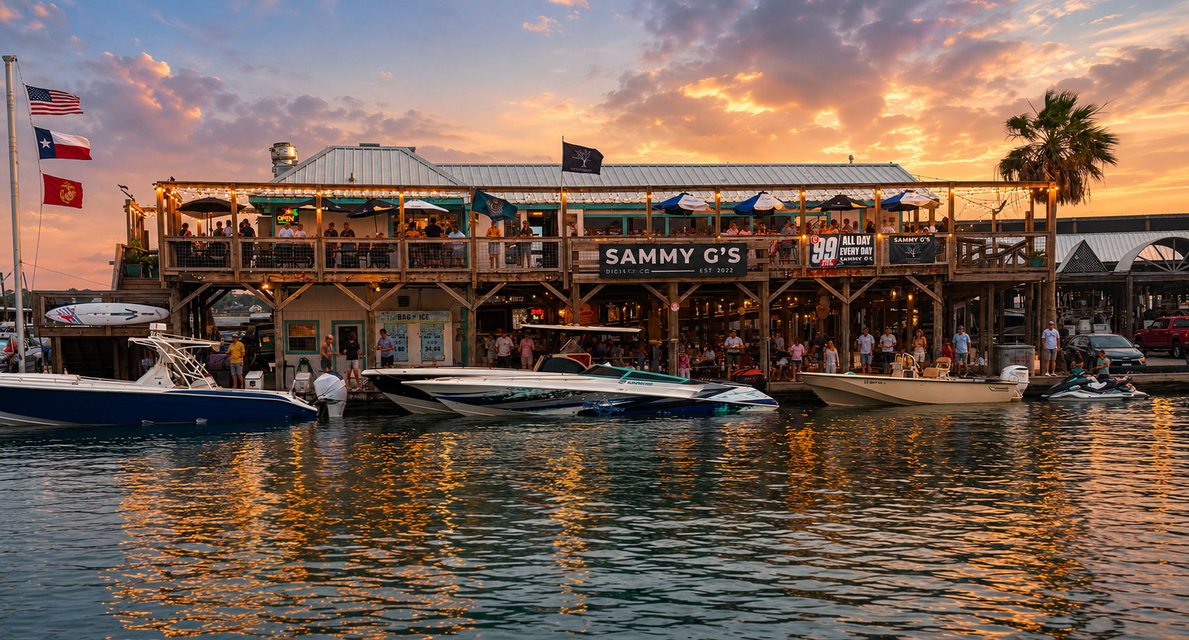 Sammy G's waterfront sunset gathering with boats docked outside
